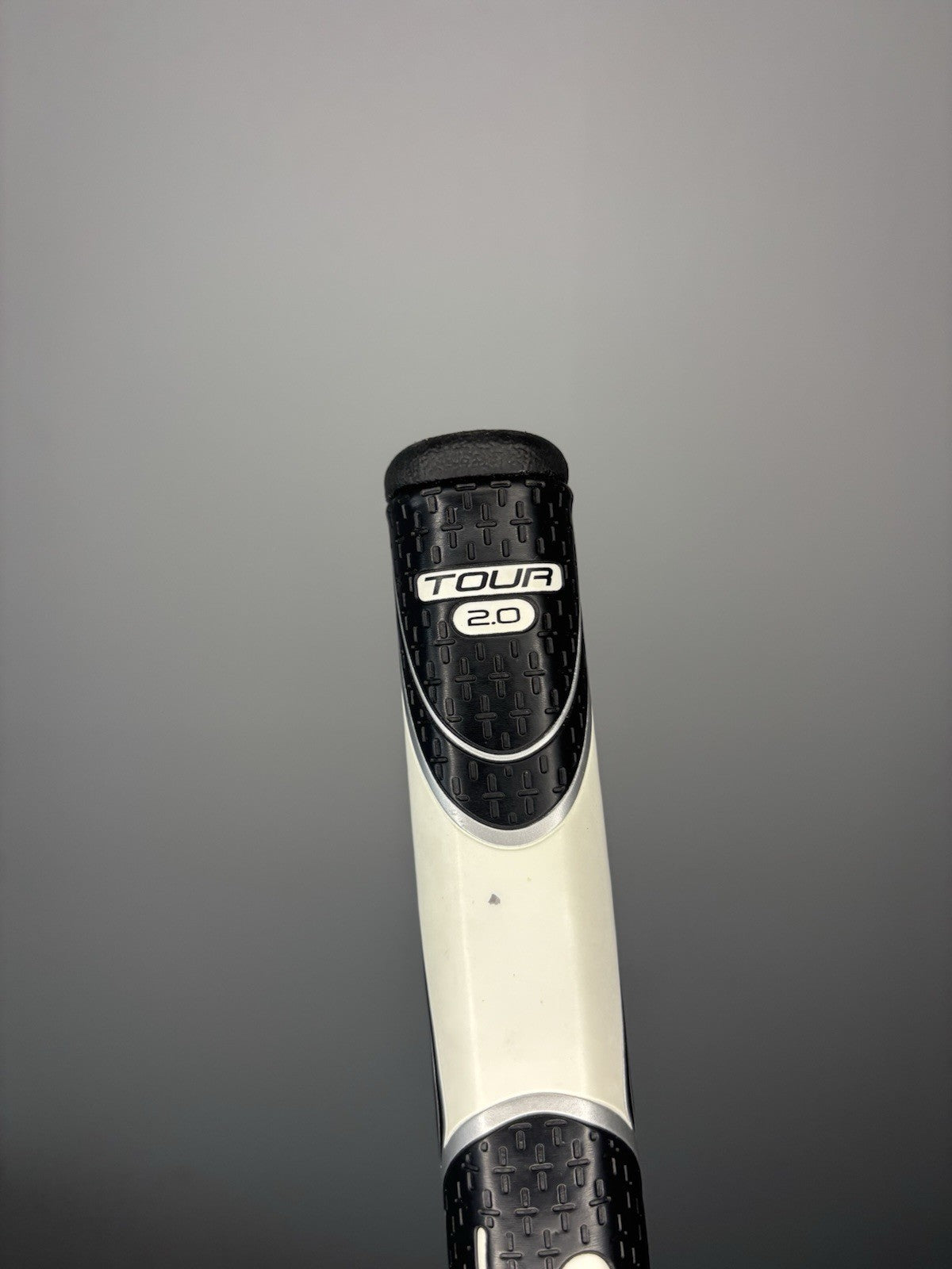 6980764