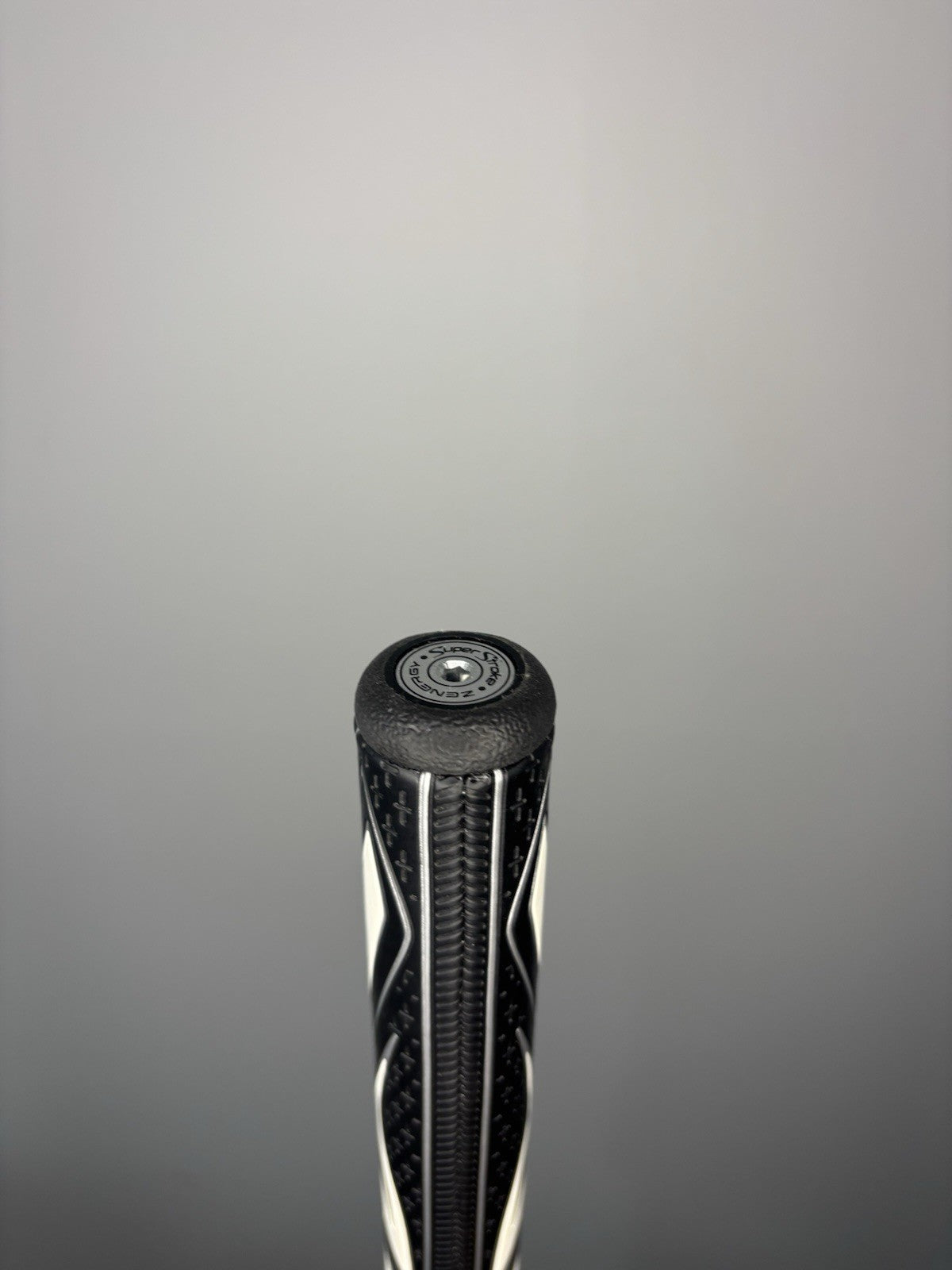 6980764