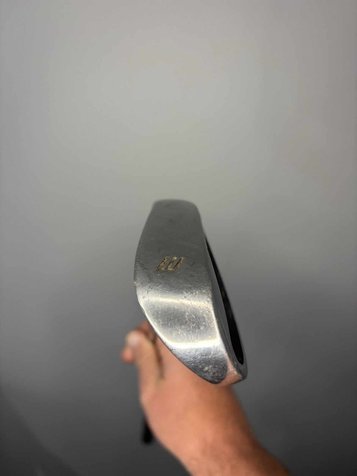 6980783