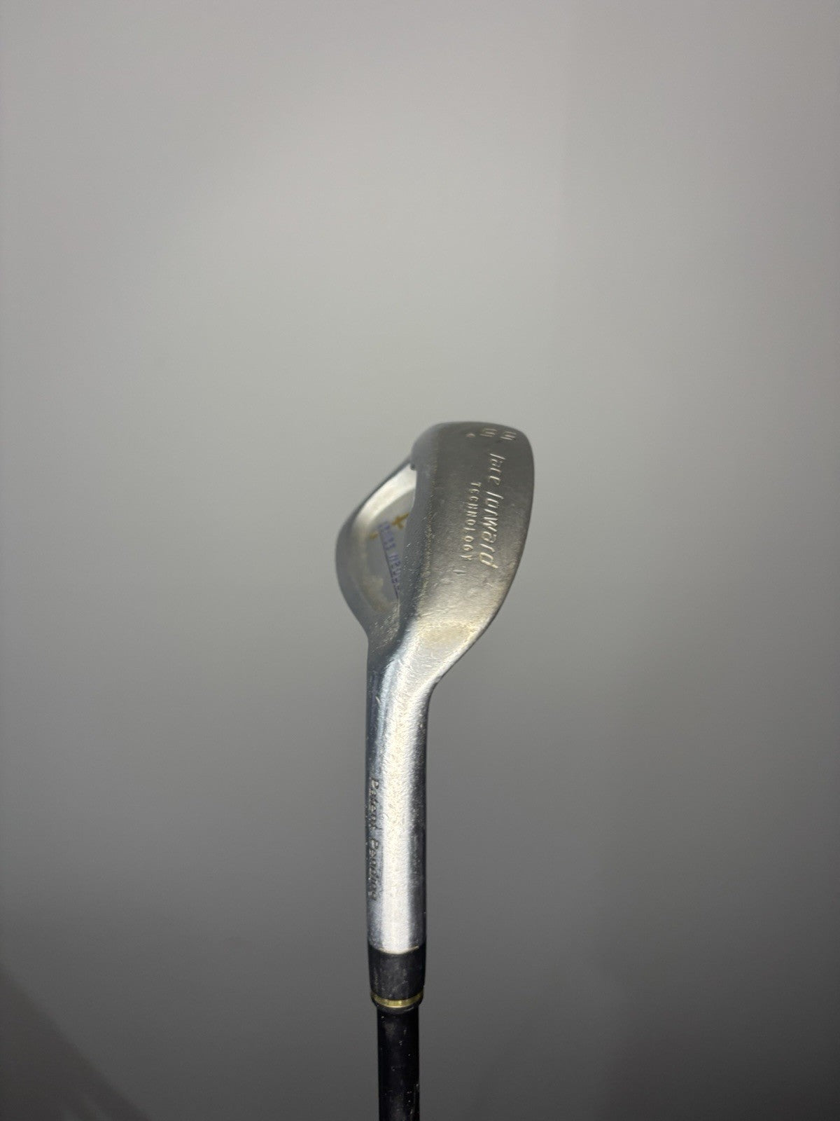 6980812