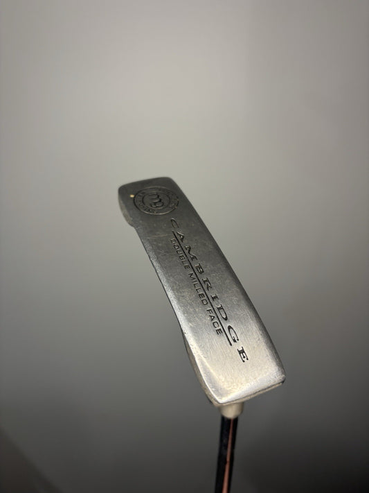 6980813