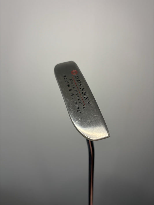 6980765