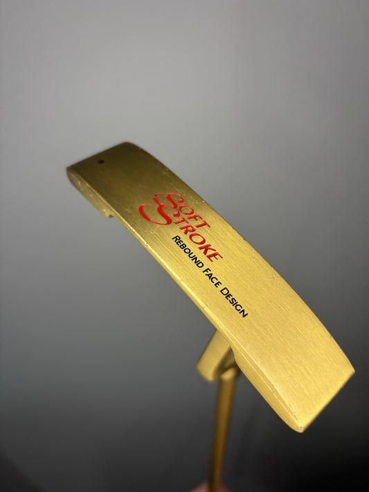 6980811